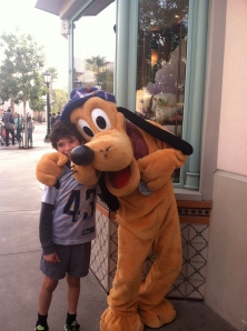 Pluto, giving my son a hug because he has such a "wicked witch" of a mother!