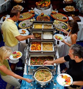 That blonde in the lower left is about to get her fingers slammed in the chafing dish lid. Not just chaffed, SLAMMED!